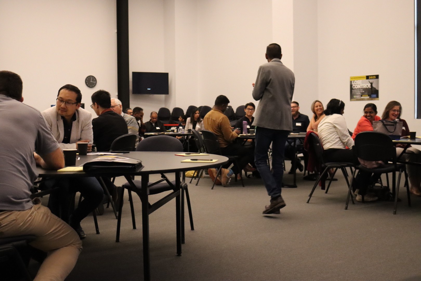 Community members meeting and talking together in a gathering space